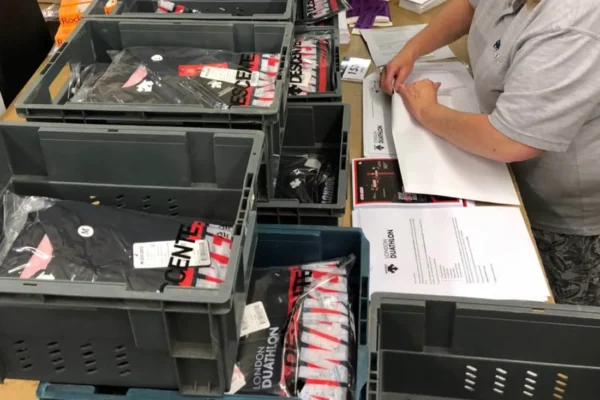 boxes of branded t-shirts