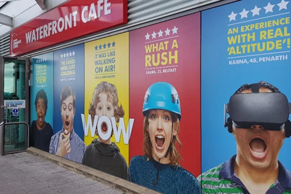 adverts on side of cafe